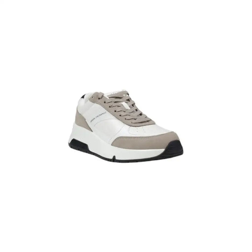 White and gray sneaker displayed for the White and Gray Sneaker product