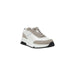 White and gray sneaker displayed for the White and Gray Sneaker product