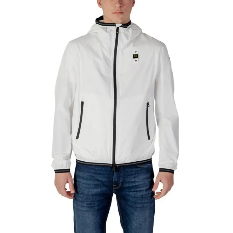 White hooded jacket with black trim displayed in a stylish product setting