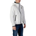 White hooded jacket with black trim showcasing modern design and versatile style