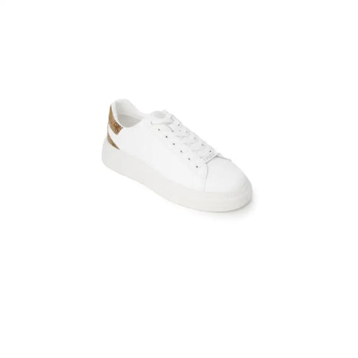 White leather sneaker with gold accents and patterned heel for stylish footwear