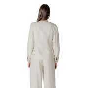 Beige long-sleeved viscose blouse for women with puffed shoulders and subtle side seam detailing