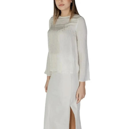 White long-sleeved blouse and skirt set from Armani Exchange Spring Summer Collection