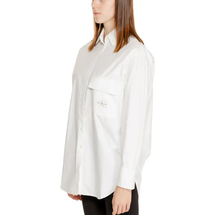 White long-sleeved button-up shirt displayed in the White Button Down Shirt product image