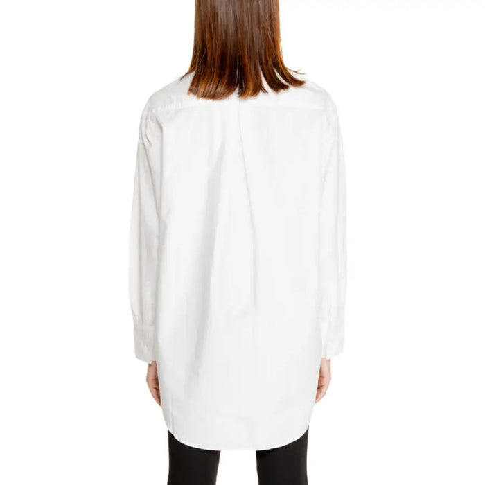 White long-sleeved button-down shirt displayed in the White Button Down Shirt product image