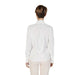 Rinascimento Women’s White V-Neck Long Blouse with light-colored pants displayed elegantly