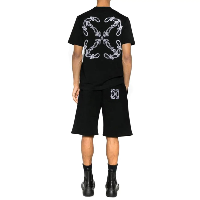 Off-white hommes t-shirt vue de dos d'un t-shirt noir à manches courtes orné d'un motif floral brodé blanc complexe et d'un emblème assorti au short