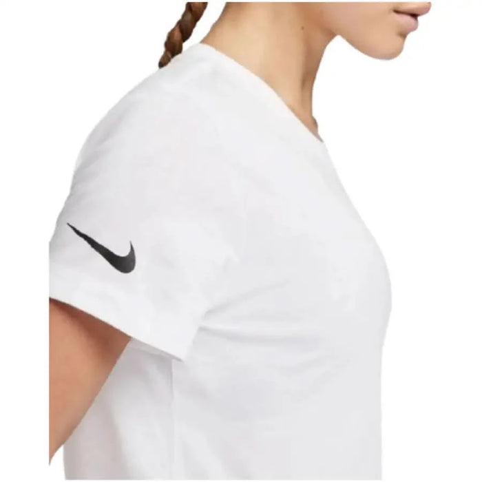 White Nike Women’s Short Sleeve T-Shirt featuring black swoosh logo on sleeve
