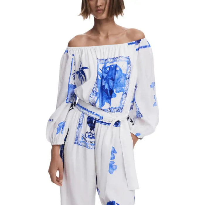 White off-the-shoulder jumpsuit with blue floral tile print for elegant summer wear