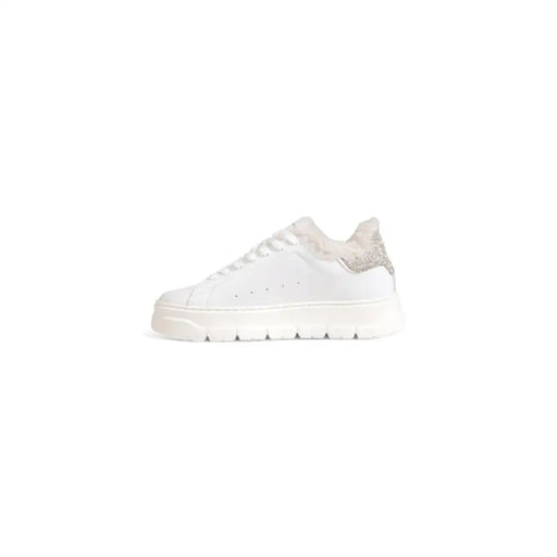 White leather sneaker featuring a glitter heel displayed for stylish footwear fashion