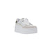 White platform sneaker with metallic accents in a stylish footwear product display