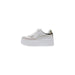 White platform sneaker with metallic accents for a stylish and modern look