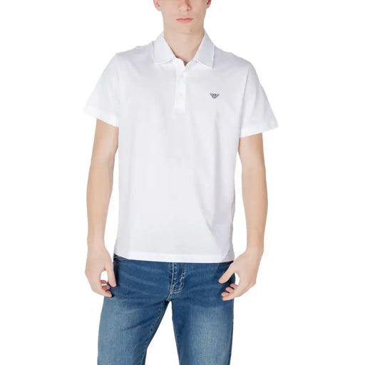White polo shirt paired with blue jeans featured in the product display