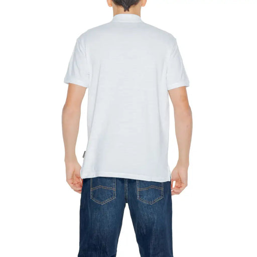 White polo shirt paired with blue jeans from the White Polo Shirt Collection