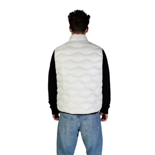 White quilted vest displayed in the White Quilted Vest product image