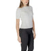 White ribbed short-sleeve top with scalloped edges from Morgan De Toi women’s collection