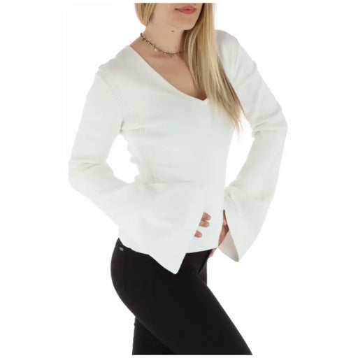White ribbed V-neck sweater with flared and bell sleeves for women