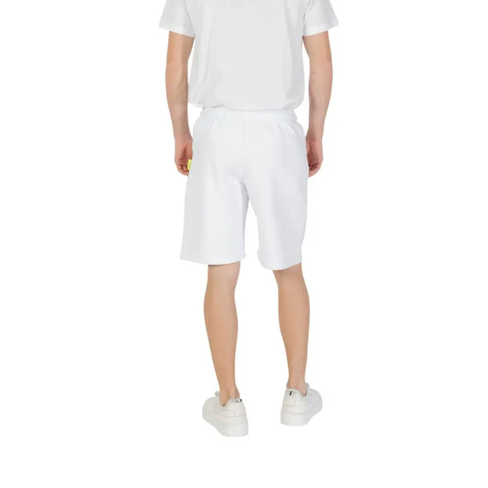 White shorts with ICON print paired with a matching white t-shirt outfit displayed