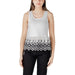 White sleeveless top featuring black floral trim for elegant summer wear