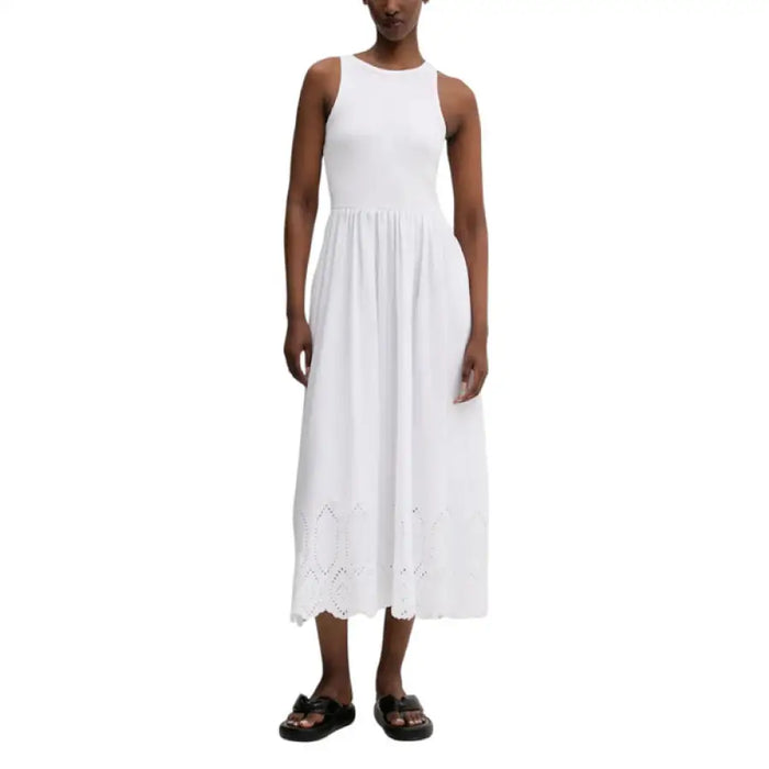 White sleeveless midi dress featured in Sleeveless Midi and Maxi Dresses in Black and Navy