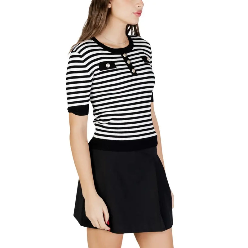 Black and white striped short sleeve knit top with button details and round neck in soft fabric for casual wear