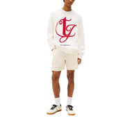 White tommy jeans sweatshirt with bold red embroidered tj logo across the chest in a casual style