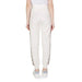 White Guess Active Women’s Cotton Trousers featuring decorative side stripes viewed from behind