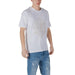 White T shirt with a graphic design paired with blue jeans for casual style