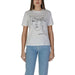White t-shirt with minimalist line drawing of abstract face design by Vila Clothes