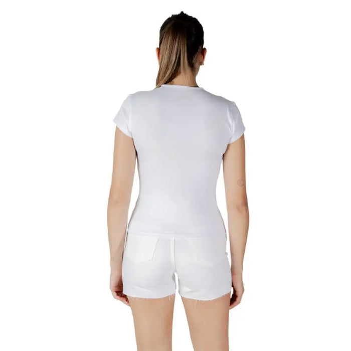 White T shirt and shorts outfit displayed for stylish casual wear