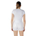 White T shirt and shorts outfit displayed for stylish casual wear