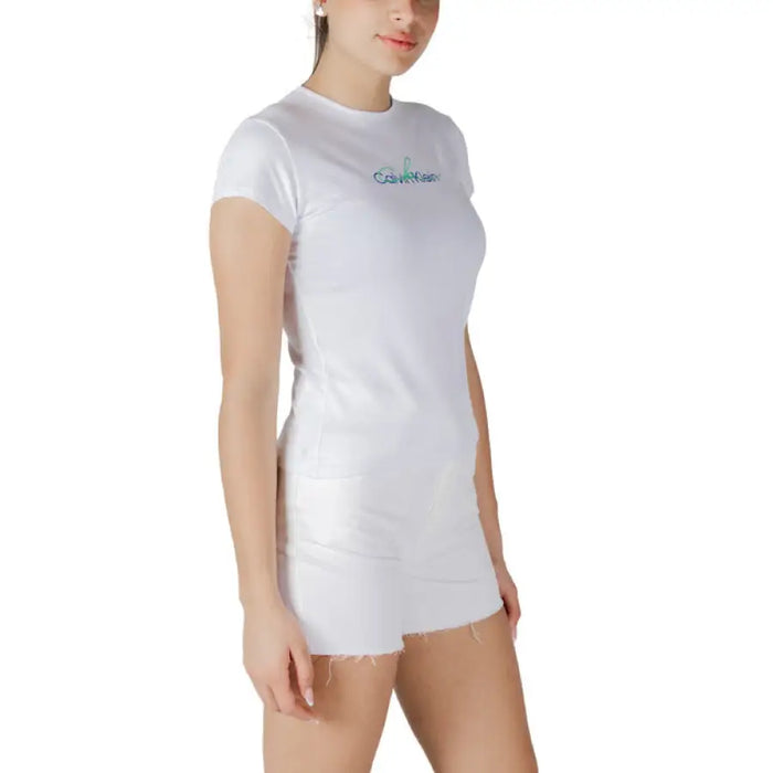 White T shirt and shorts outfit displayed on a model for casual summer wear