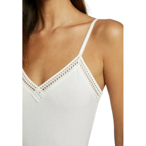 White V-neck camisole top with delicate lace trim for elegant and comfortable wear