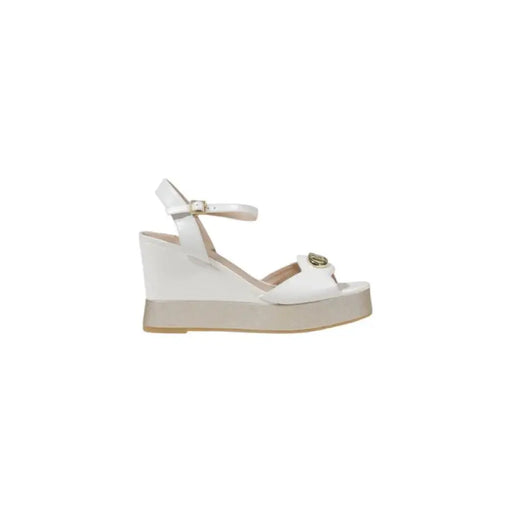 White wedge sandal displayed for the product White Wedge Sandal on a retail website