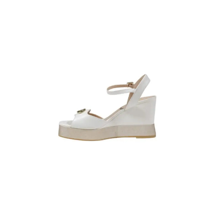 Elegant white wedge sandal displayed as part of the White Wedge Sandal product collection
