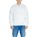 Calvin Klein Jeans Men White Zip-up Bomber Jacket over Blue Jeans - Stylish Menswear Ensemble