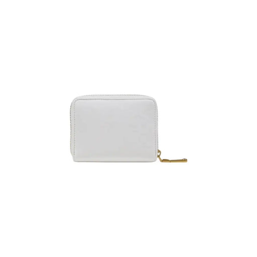 White patent leather wallet with gold hardware featuring a zippered closure