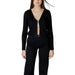 Woman wearing Morgan De Toi Black V-Neck Cardigan and black pants