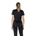 Woman wearing black crop top and jeans showcasing the Black Tie Front T Shirt with Grommets