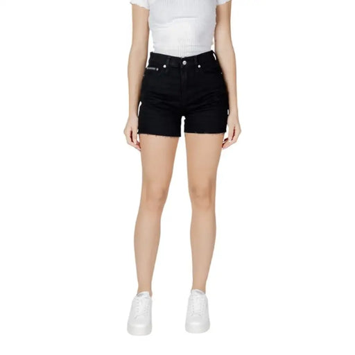 Woman wearing stylish Women’s Black Denim Shorts suitable for casual wear