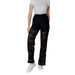 Woman modeling Elegant Black Lace Pants with fashionable black lace detailing