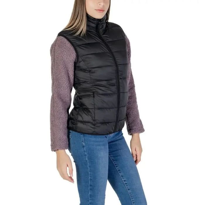 Woman showcasing B.young Black Nylon Turtleneck Gilet with Front Pockets