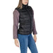 Woman showcasing B.young Black Nylon Turtleneck Gilet with Front Pockets