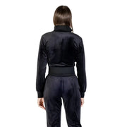 Woman wearing Guess Active Black Velvet Tracksuit with Rhinestone Zip Front Sweatshirt