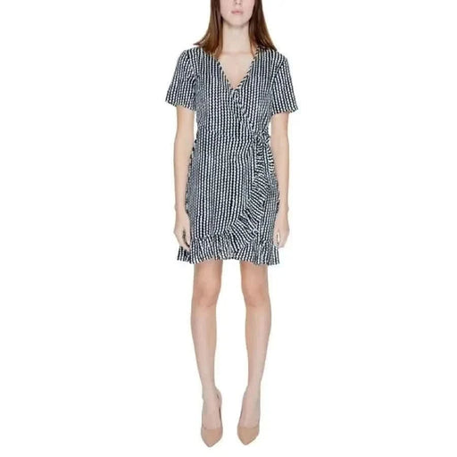 Urban style: Woman in a black and white striped dress - Only Clothing Women Dress