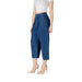 Woman wearing blue denim culottes and beige heels showcasing fashionable style