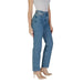 Woman showcasing Calvin Klein Women’s Blue Cotton Jeans in stylish blue denim