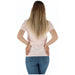 Woman wearing a pink T-shirt and blue jeans, showcasing casual fashion style