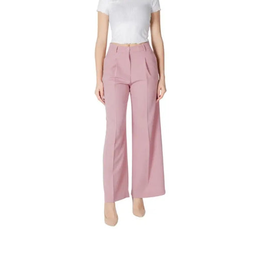 Woman modeling stylish Pink Wide Leg Pants for Women in a chic setting
