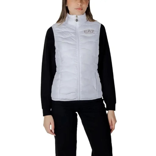 Woman in white puffer vest showcasing EA7 Women’s Sleeveless Turtleneck Jacket